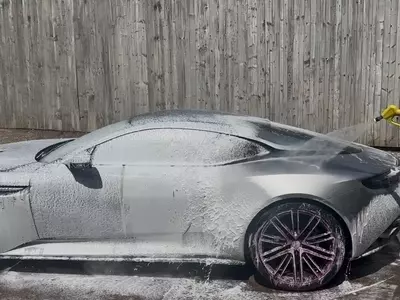 Professional vehicle wash using the custom pressure washer system installed at a detailer&rsquo;s workshop in Coalville To Wash An Aston Martin DB12